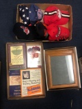 Baseball hats, books, picture frames