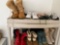 2 shelves boots women?s size 7 and 8, 1 is J Crew, Nike