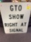 GTO show right at signal street sign