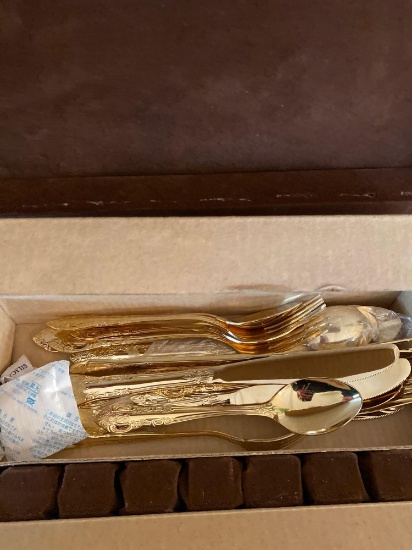 Gold colored flatware set