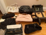 Lot of purses, some brand new, Betsy Johnson, Steve Madden, Prada, Dooney and Burke and more