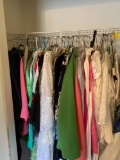 Half the contents of this closet, all very nice women?s clothes, dresses