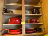 Entire contents of kitchen cabinets, enamel cast iron, casserole dishes, glass pots and pans