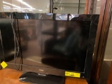 36 inch Haier flat-screen TV with remotes