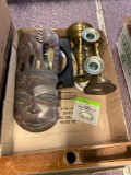 Brass candlesticks, African mask, cast iron Amish and owl figures, glass canister