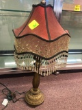 Lamp with fringed shade