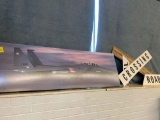 Wall decor jet plane and cardboard railroad crossing sign