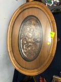Carved end table with cherubs