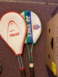 2 tennis rackets dumbells, and metal piece