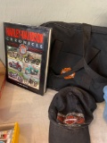 Harley Davidson book, hat, bag, and blanket