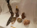 African carvings, shells, gator skull