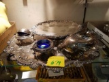 Silverplate trays, ladle, cobalt salt dips with covers.
