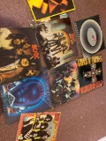 Box of vintage records, KISS, AC/DC, Journey, Guns 'N Roses, Van Halen, ZZ Top, Def Leppard