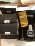 4 watches in boxes