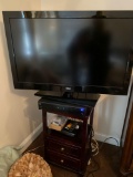 RCA TV approx. 37 inch, and TV stand, DVD player