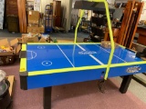 Air hockey table with puck and paddles