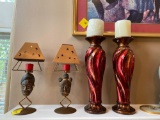 2 large candle holders and African themed candle holders