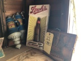 Stroh's and Hudepohl beer signs and wood ship sign