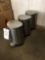 Three stainless trash receptacles