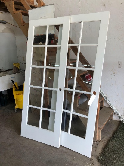 Two 30x80 glass pane doors.