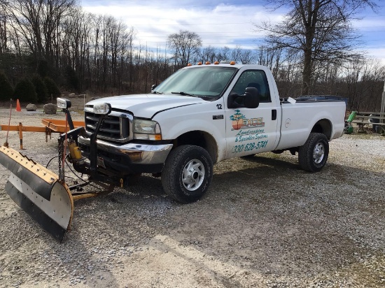 2003 Ford F-250 super duty 4x4 with plow.