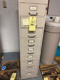 Metal cabinet with contents