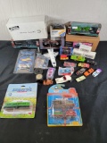 Assortment of Collectible Cars and Toys