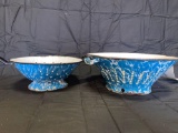Pair of blue graniteware colanders