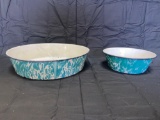 Pair of light green swirl graniteware bowls