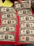 (11) two dollar bills