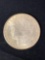1880-CC Morgan dollar, AU.