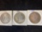 (3) Morgan silver dollars (1881, 1884, 1887). Bid times three.