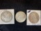 (3) Morgan silver dollars (1903, two 1921). Bid times three.