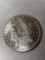 1884 Morgan dollar, AU.