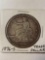 1876-S Trade silver dollar.