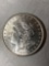 1886 Morgan dollar, AU.