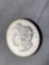 1904-O Morgan dollar, AU.
