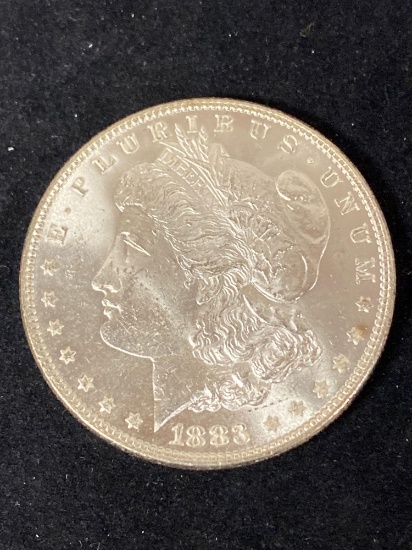 1883 Morgan dollar, AU.