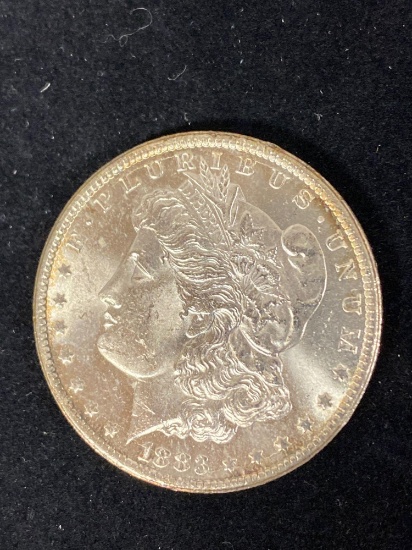 1883-CC Morgan dollar, AU.