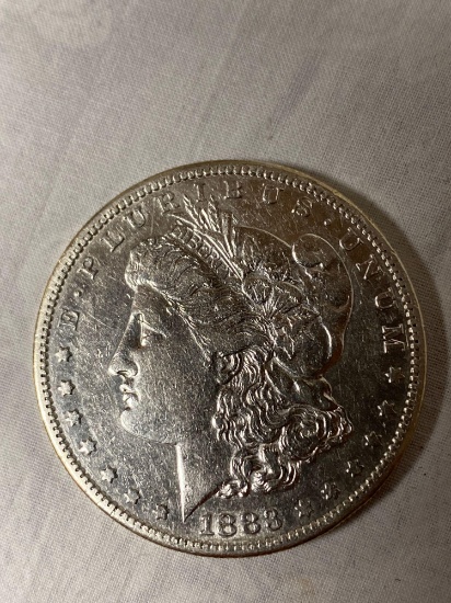 1883-S Morgan dollar, AU.