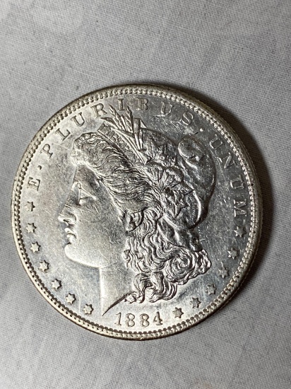 1884-S Morgan dollar, AU.