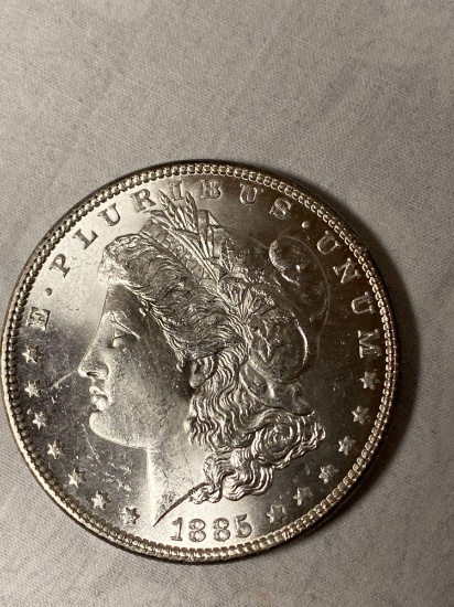 1885 Morgan dollar, AU.
