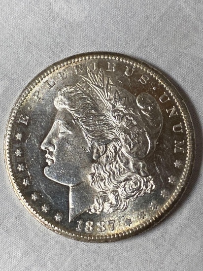 1887-S Morgan dollar, AU.