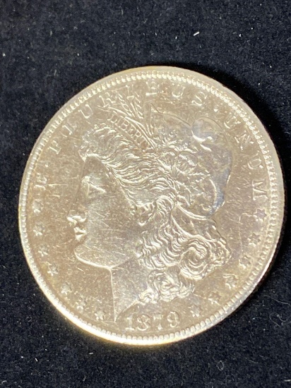 1879-CC Morgan dollar, AU.