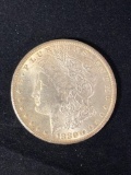 1880-CC Morgan dollar, AU.