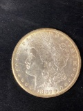 1882-CC Morgan dollar, AU.