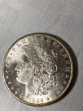 1884-CC Morgan dollar, AU.