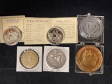 (6) Commemorative medals.