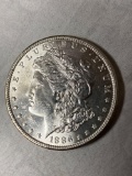 1886 Morgan dollar, AU.