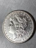 1889-CC Morgan dollar, AU.